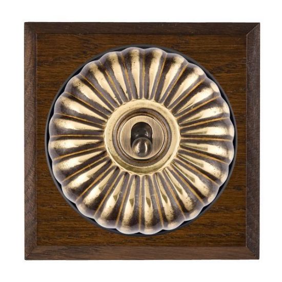 Picture of 1 Gang 20AX 2 Way Toggle Switch - Fluted Dome Dark Oak Chamfered Edge/ Antique Brass/ Black Collars